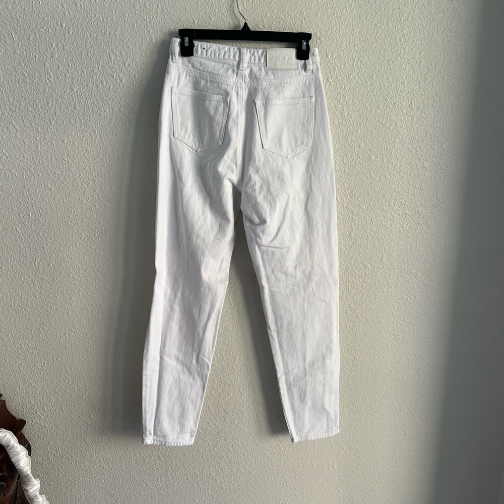 White Ripped High Rise Mom Jeans
Riot Missguided
Size: 4 - Picture 2 of 3